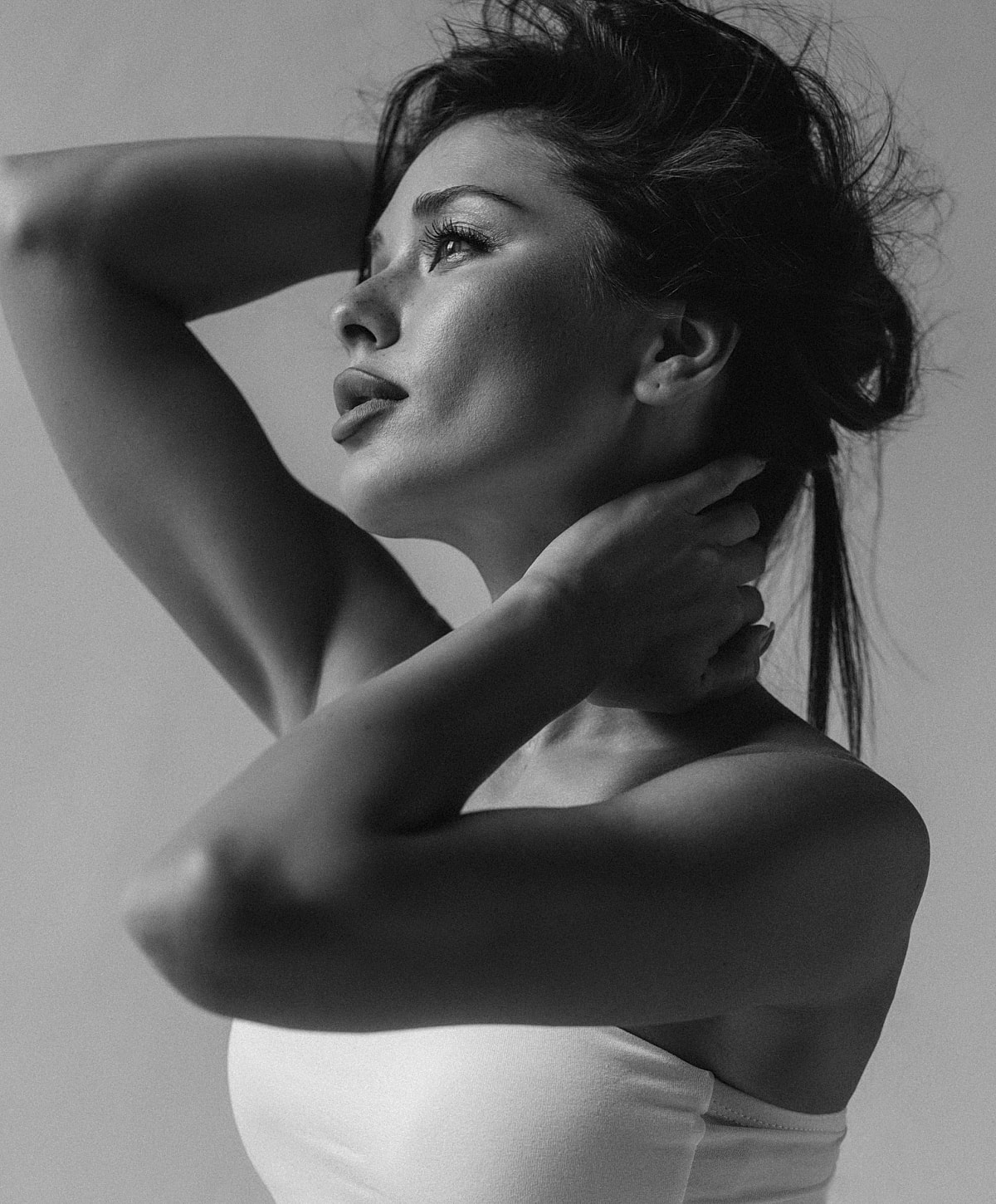 Black and white side profile of a woman.