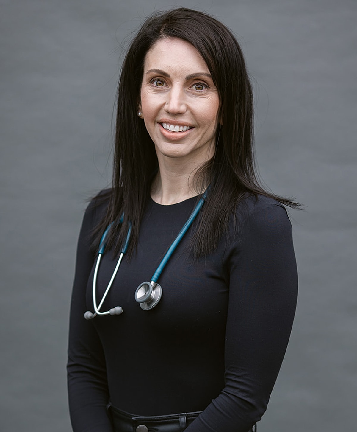 Female healthcare professional with stethoscope.